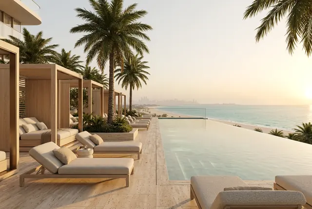 Infinity pool deck with cabanas facing the sea